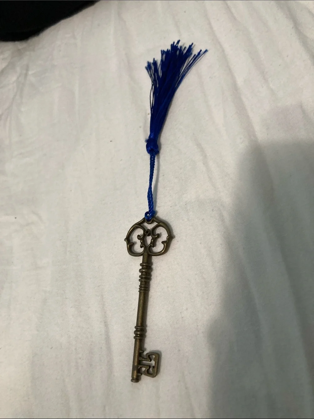 Antique-Style Brass Skeleton Key Wall Decor with Blue Tassel